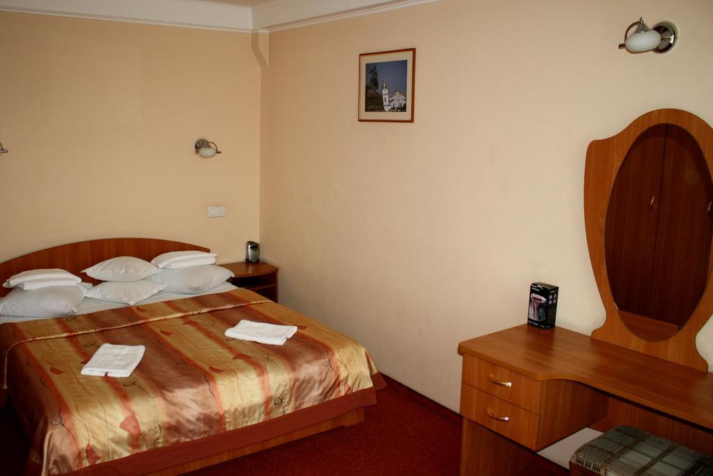 Druzhba Service Hotel Kyiv Quarto foto